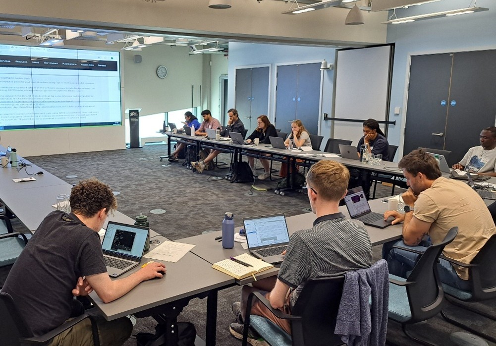 Participants at the training course working on laptops